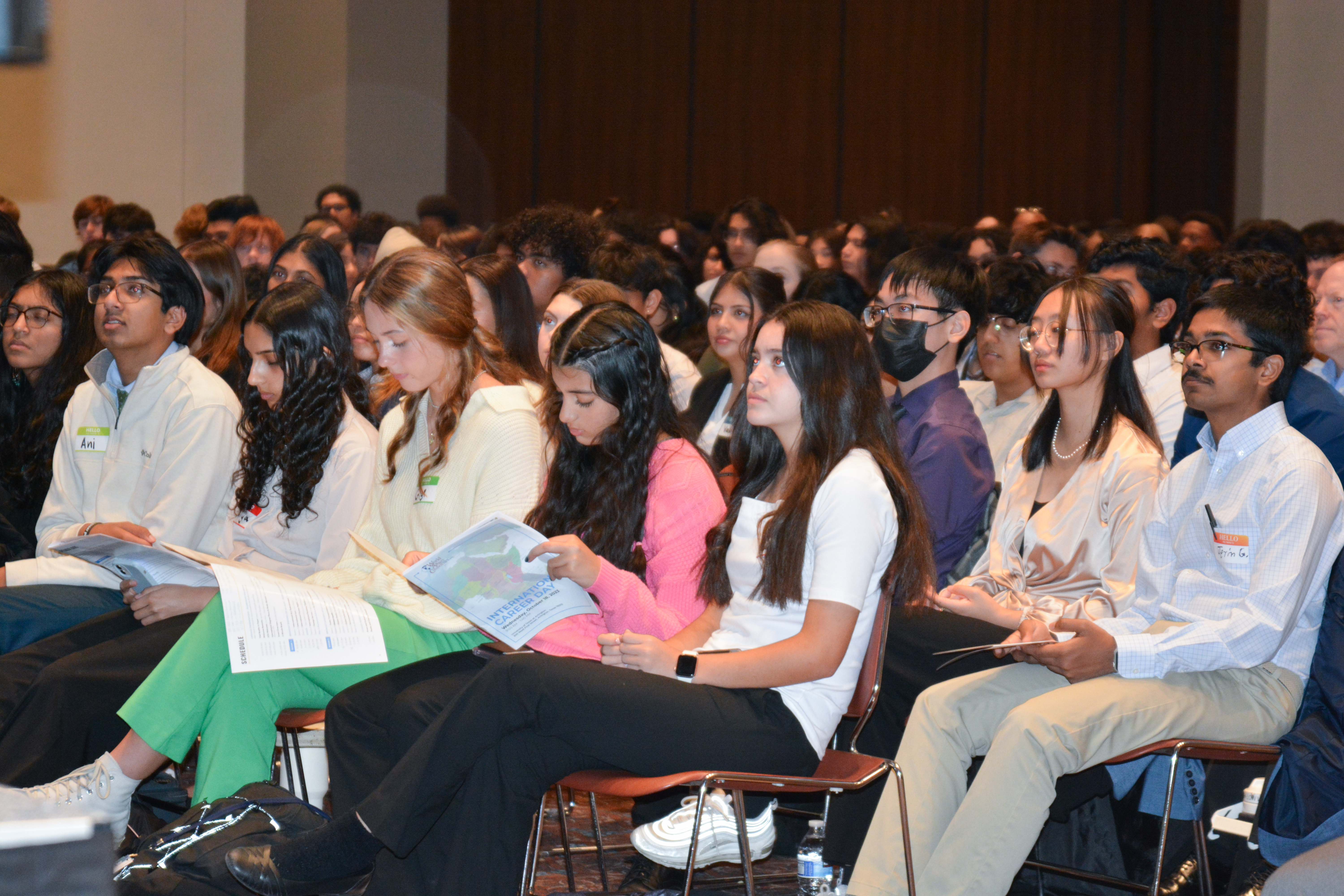 Students listening to a presentation