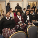 Thumbnail of http://A%20group%20of%20students%20are%20seated%20at%20a%20speaking%20event.