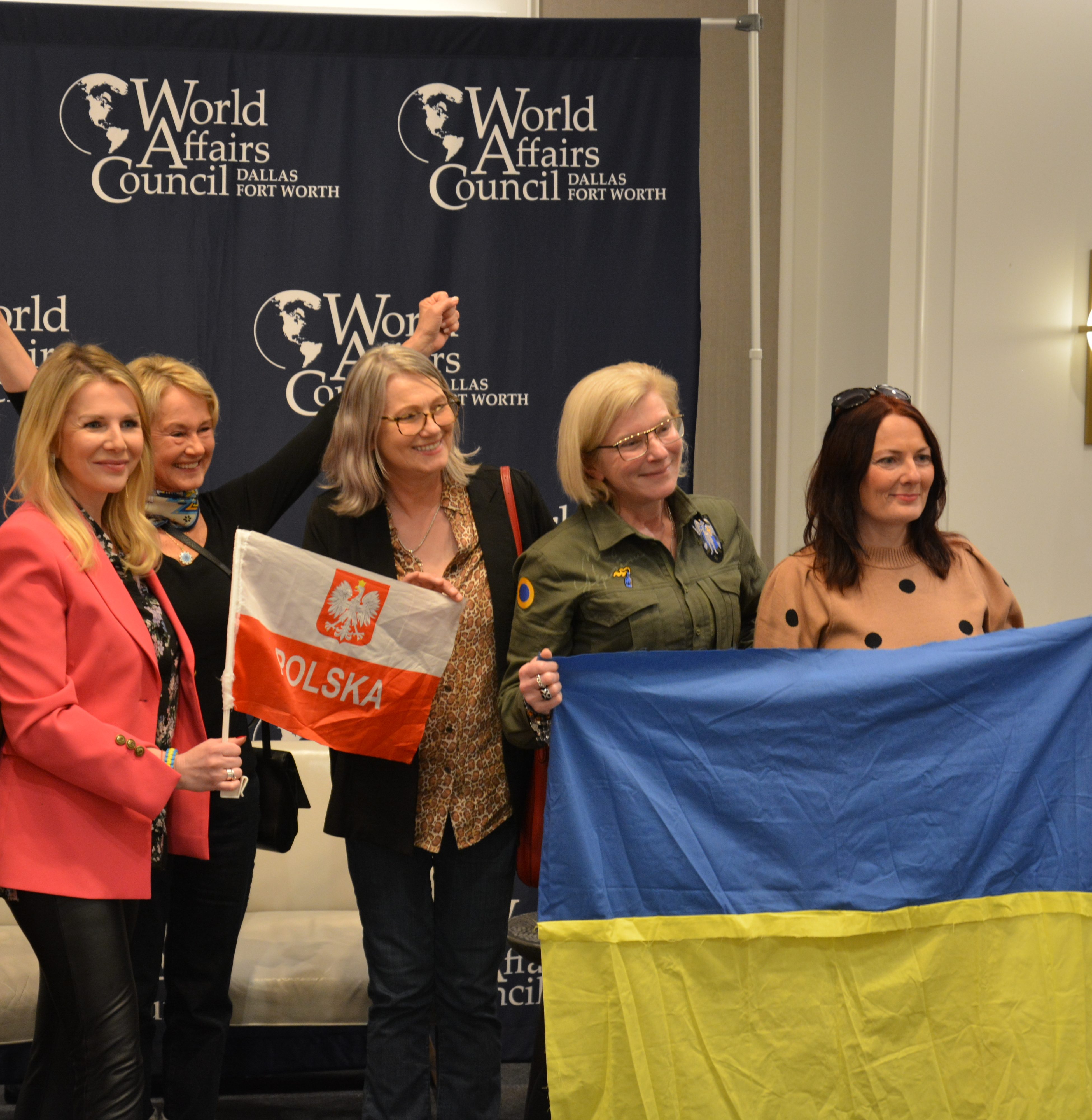 International Women of Courage event speakers and Polish/Ukrainian attendees