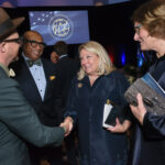 Thumbnail of http://Mallon%20Award%20Dinner%20-%20Attendees%20greet%20Honoree%20Amb.%20Jeanne%20L.%20Phillips%20and%20moderator%20Karen%20Hughes