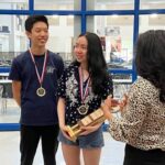 Thumbnail of http://Students%20gather%20in%20celebration%20of%20their%20win.