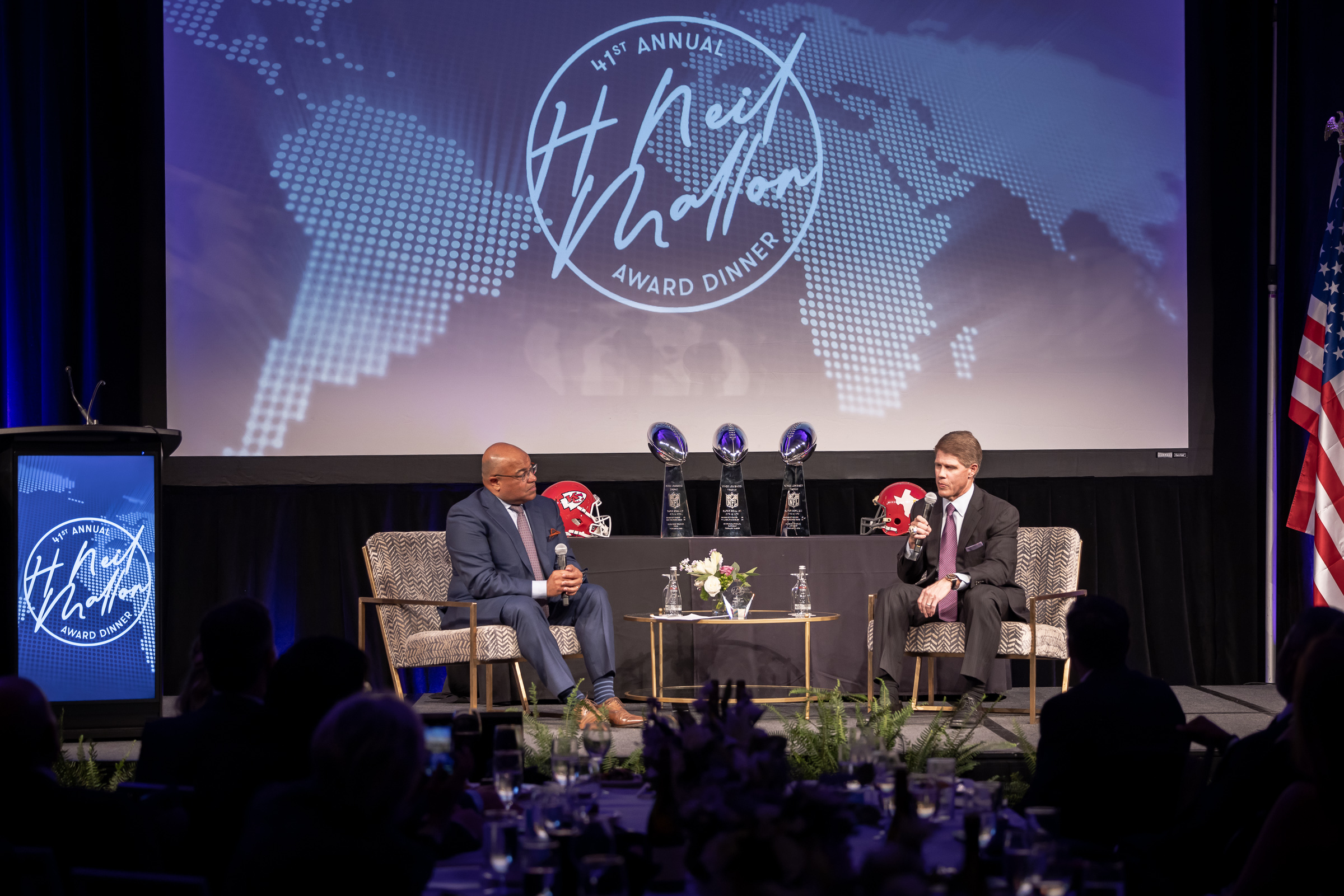 Clark Hunt and Mike Tirico on stage at 41st Mallon Award Dinner